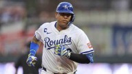 Royals score four in eighth to snap Mariners’ 10
