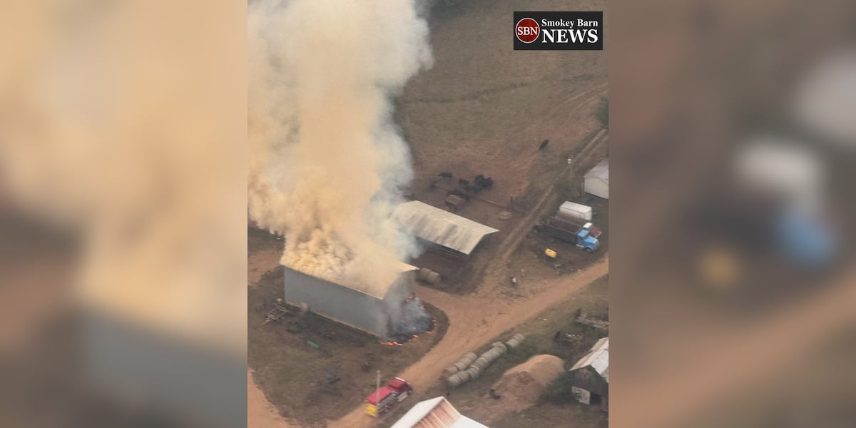 Crews fighting tobacco barn fire in White House
