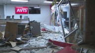 Car in pursuit slams into building in Downtown Atlanta, narrowly missing people