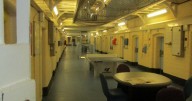 Murder charge after prisoner is found dead in his cell