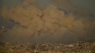 Israeli strikes on Gaza City kill at least 14