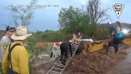 Child, woman and dog rescued amid flooding in southwest New Mexico