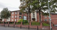 Woman dies after 'falling from window' at care home as investigation launched