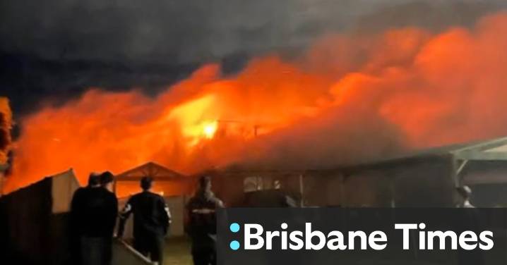 Woman charged with manslaughter after two children die in house fire