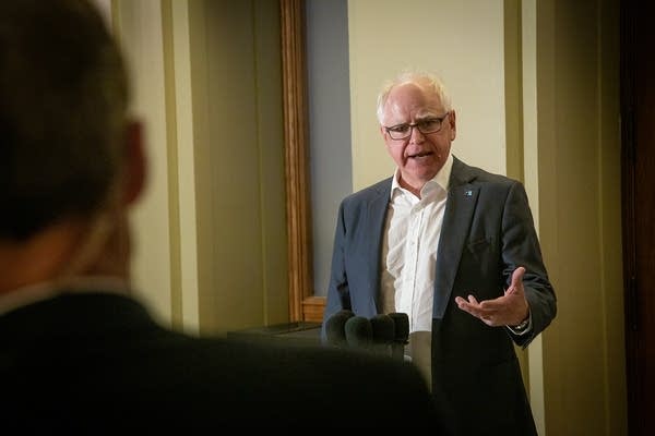 Walz campaigns as 'battle-tested' leader for Minnesota