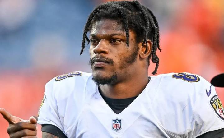 Video: Lamar Jackson has heated reaction after Bills fan smacks his helmet