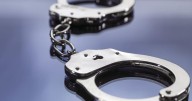 Woman charged with communicating threats on school property