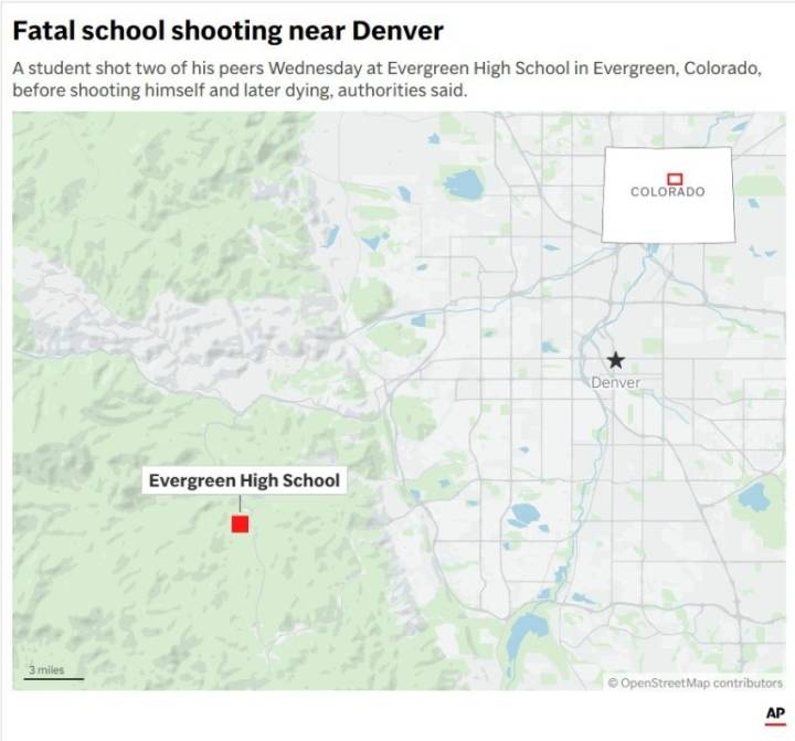 Authorities say student who had been radicalized fired revolver at Colorado school, wounding 2