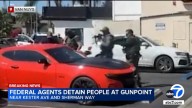 Federal agents detain multiple people at gunpoint in Van Nuys, video shows