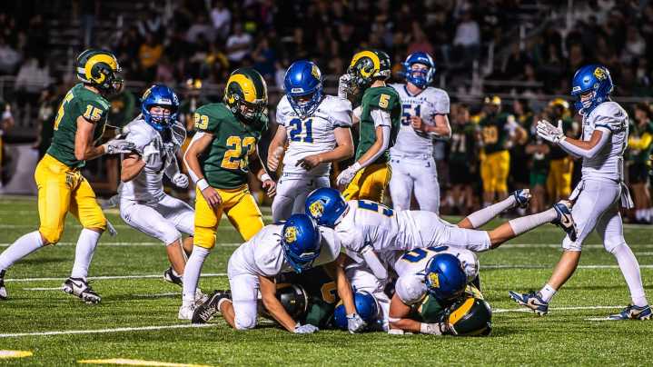 Football Notes: Coach picks family over game; king caps day with TD