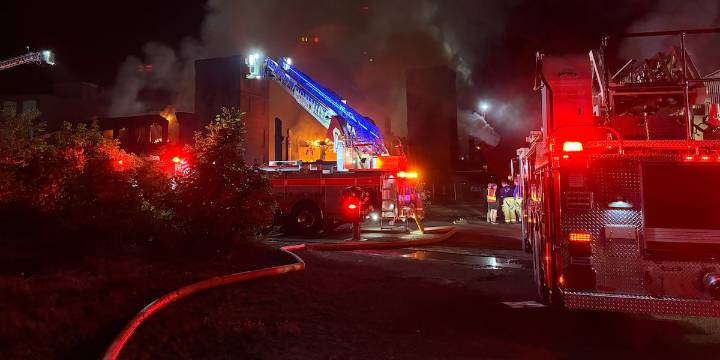 Firefighters battling fire at former Stone container company