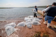 Pescadores de presa Calderón reciben capacitación en sanidad e inocuidad