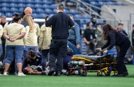 Deadspin | Savannah DeMelo collapses on field, Louisville-Seattle match abandoned