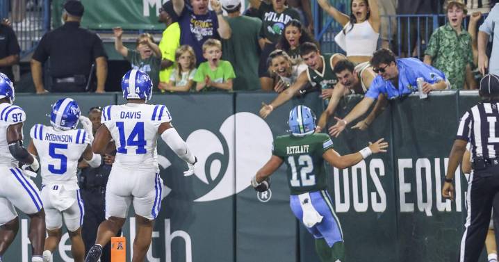 Record-setter: Jake Retzlaff runs for four TDs as Tulane beats Duke and Darian Mensah