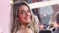 Amal Clooney is a vision in plunging dress for 'private gathering' in Lake Como with George