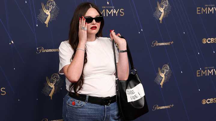 Megan Stalter Wears T-Shirt, Jeans, 'Cease Fire!' Bag at 2025 Emmys