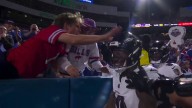 Bills fan shoves Lamar Jackson's helmet, and Lamar shoves back