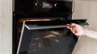 Cleaning Black Kitchen Appliances With Vinegar Will Fix This Classic Problem