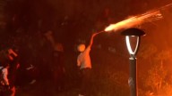 Protests paused in Indonesia amid security fears after deadly clashes and government concessions