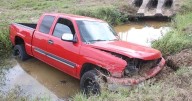 Pickup goes off road and lands in ditch