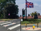 Red cross appears on local landmark as 'patriotism' or 'divisive' flag debate continues