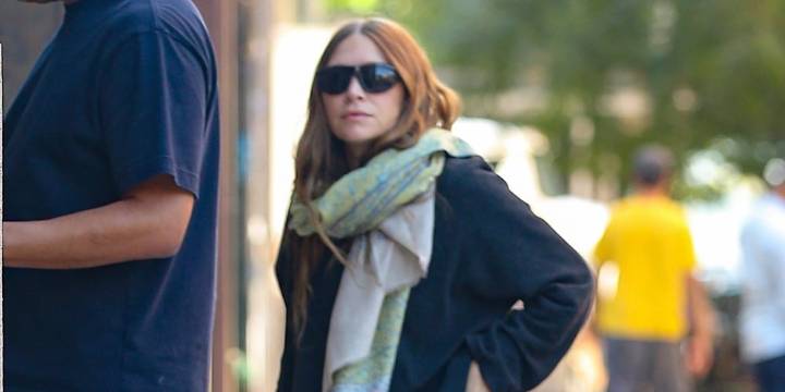 Ashley Olsen Bundles Up in Scarf & Sweater Despite Warm New York City Weather 