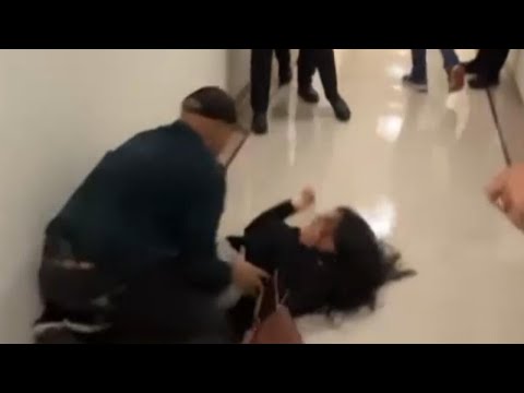 ICE officer returns to duty after being caught on video pushing woman to ground