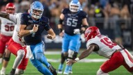 Monarchs reach 100 wins in rain-soaked battle against Liberty