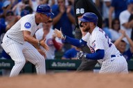 Busch stars as the Cubs beat the Cardinals 7-3 to clinch the top NL wild card – Winnipeg Free Press