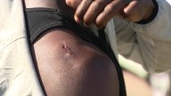 Father shot while protecting son from armed teens