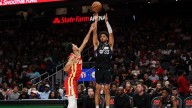 Wolves sign Johnny Juzang