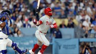 Dodgers comeback falls short in extra innings as Phillies clinch NL East title with thrilling 6