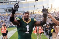 Micah Parsons helps Packers down Detroit. Check out pics from his 1st game in Green Bay