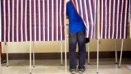 DOJ sues Maine and Oregon for voter rolls