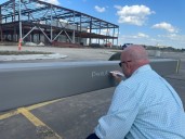 Hutchinson community signs final beam for new YMCA