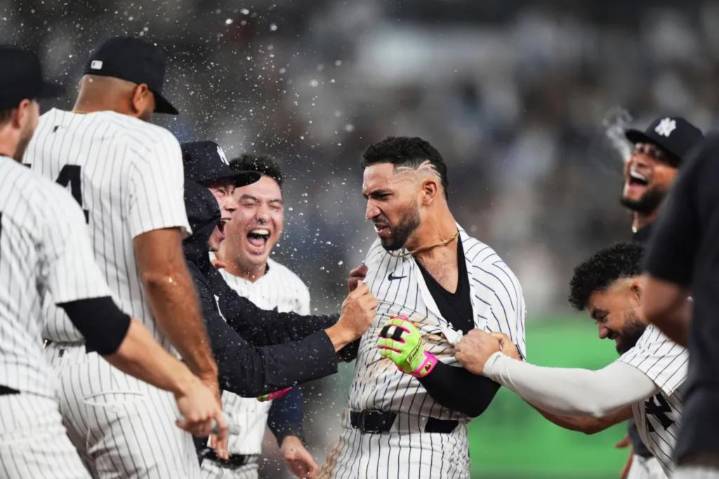 Yankees clinch playoff spot with thrilling walk