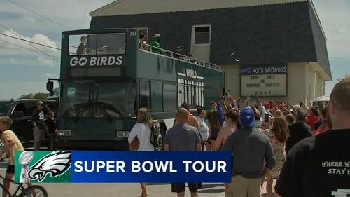 Eagles cheerleaders, mascot kick off bus tour with legend Brandon Graham