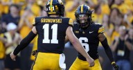 Two explosive passes, a trick play and a QB keeper carried Iowa to a blowout win over UMass