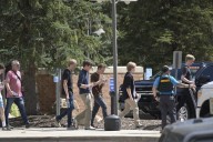 Report says school shooting suspect was fascinated with mass shootings and expressed neo