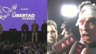 Le partieron la cara de un botellazo a un notero de América TV en el acto de Milei