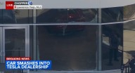 3 hurt after car crashes through window of N.J. Tesla dealership