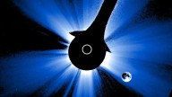 Rare satellite footage shows the moon eclipsing the sun on a strangely crooked path