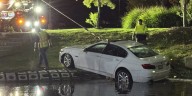Police help get car out of North Charleston retention pond