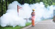China battles mosquito-borne virus with Covid-era methods as U.S. issues travel warning