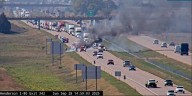 Crews battling trailer fire on I
