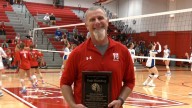 Todd Holmberg surprised with recognition for two decades with Naperville Central volleyball