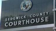 Wichita man charged in assault of teen waiting for school bus