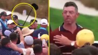 New footage shows beer being thrown at Rory McIlroy and wife as Ryder Cup star searches for culprit