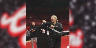 Harper Murray, adidas gift custom jacket to Coach Dani Busboom Kelly ahead of home opener