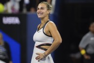 Defending US Open champ Sabalenka returns to semifinals when Vondrousova withdraws with knee injury